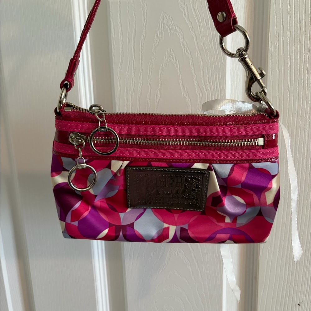 Pink Coach Poppy Wristlet